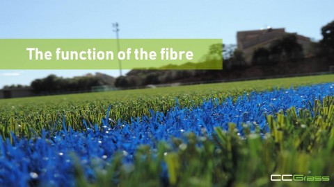 How do the artificial grass fibers play different functions